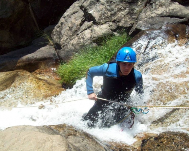  Holding the rappelling rope 